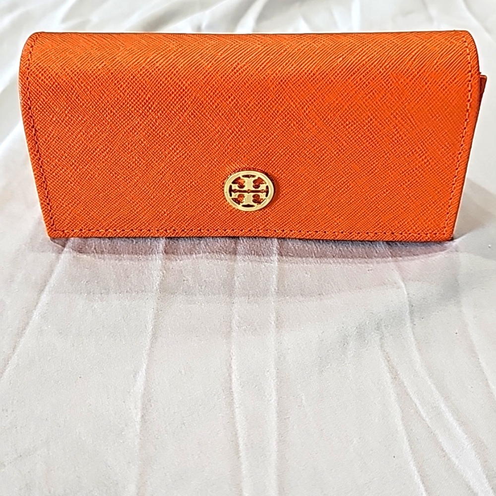 Tori Burch sunglasses case.